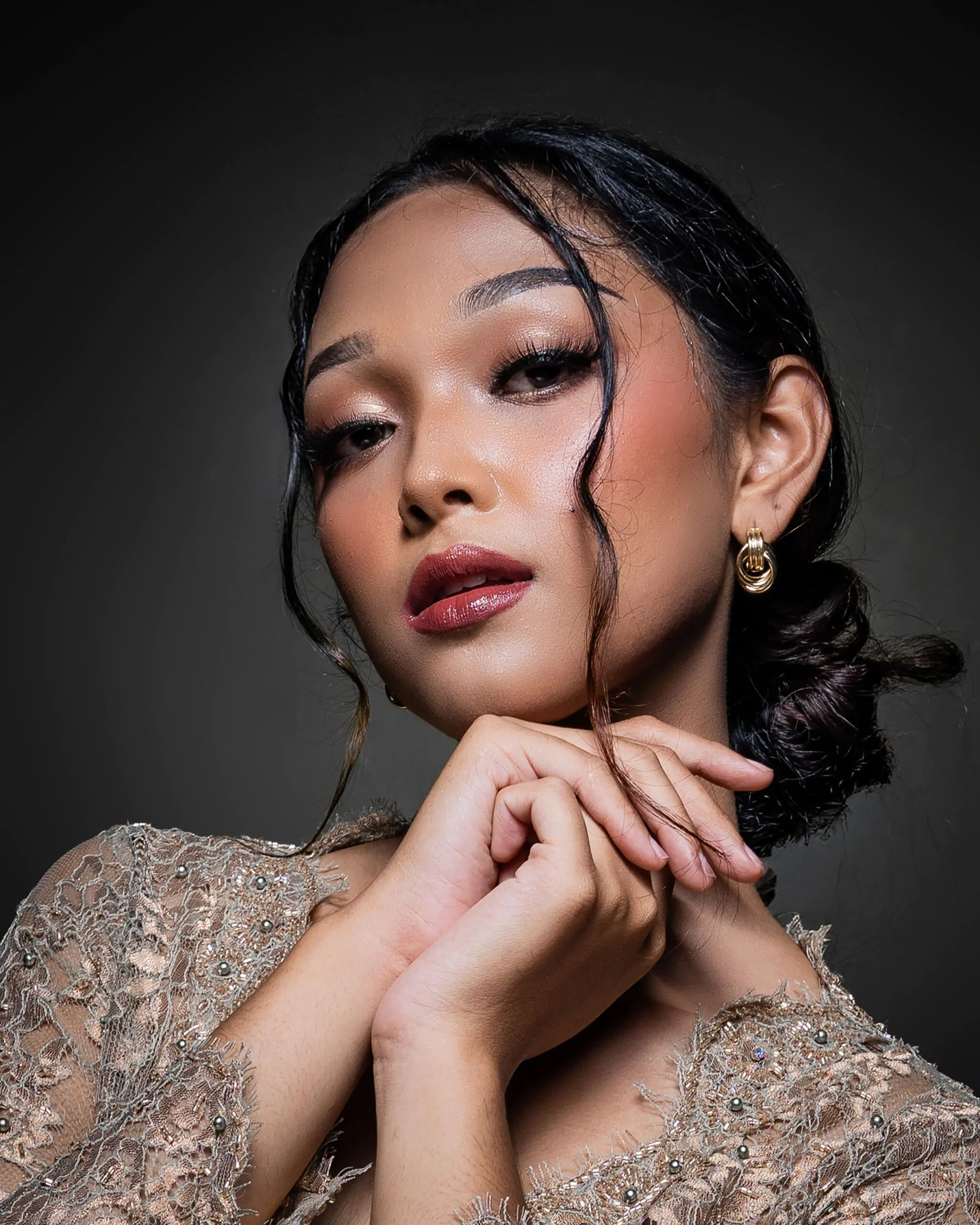 Elegant occasion makeup look with soft glam eyes and a radiant finish